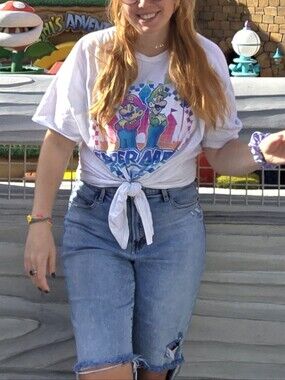 Nintendo White Super Mario Graphic Tee with Blue, Red, Green & Yellow Art